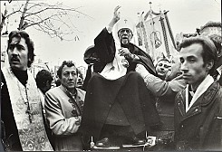 Metropolitan Mstyslav being carried into the Church of the Elevation of the Holy Cross in Ternopil, Ukraine. November 7, 1990.